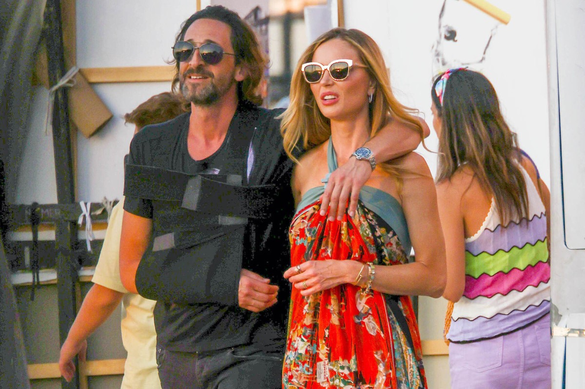 Adrien Brody and Georgina Chapman hug each other and more star photos
