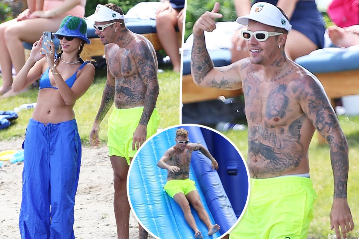 Justin Bieber smiles as he rides across the lake during Ramsay Hunt's recovery