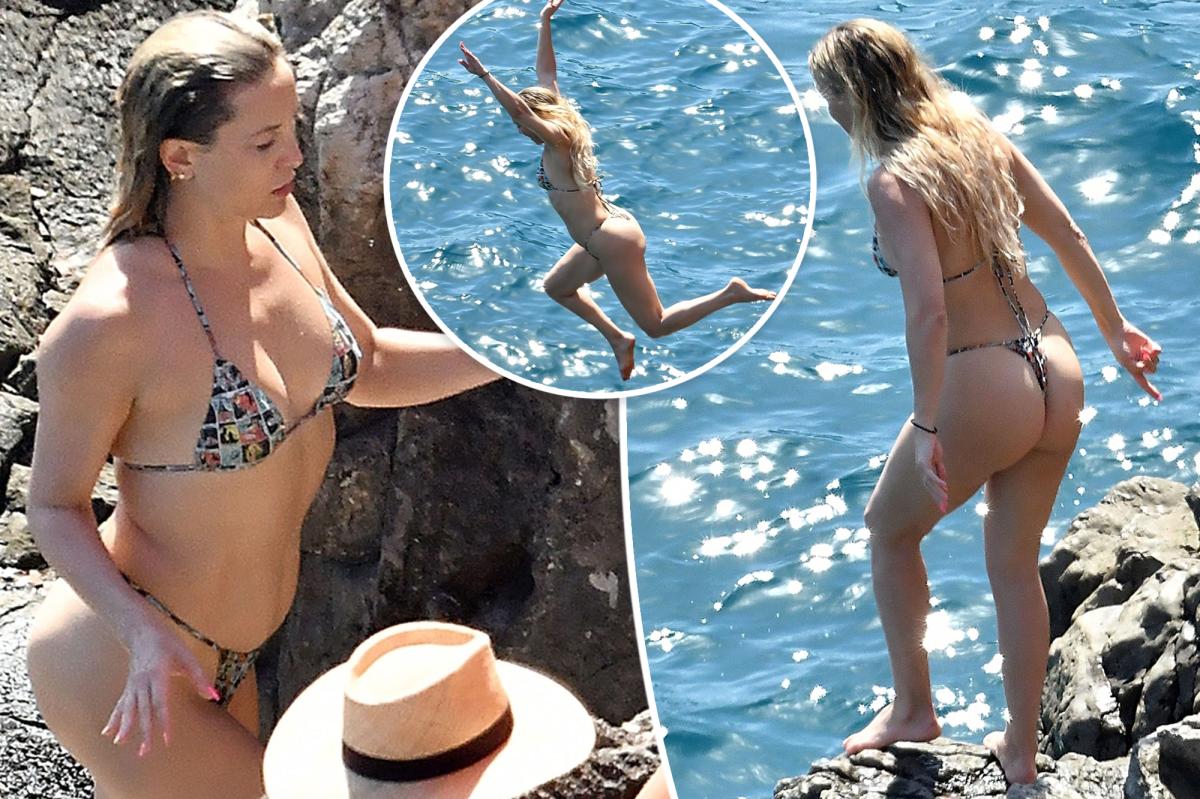 Kate Hudson dives into the sea in a string bikini on vacation