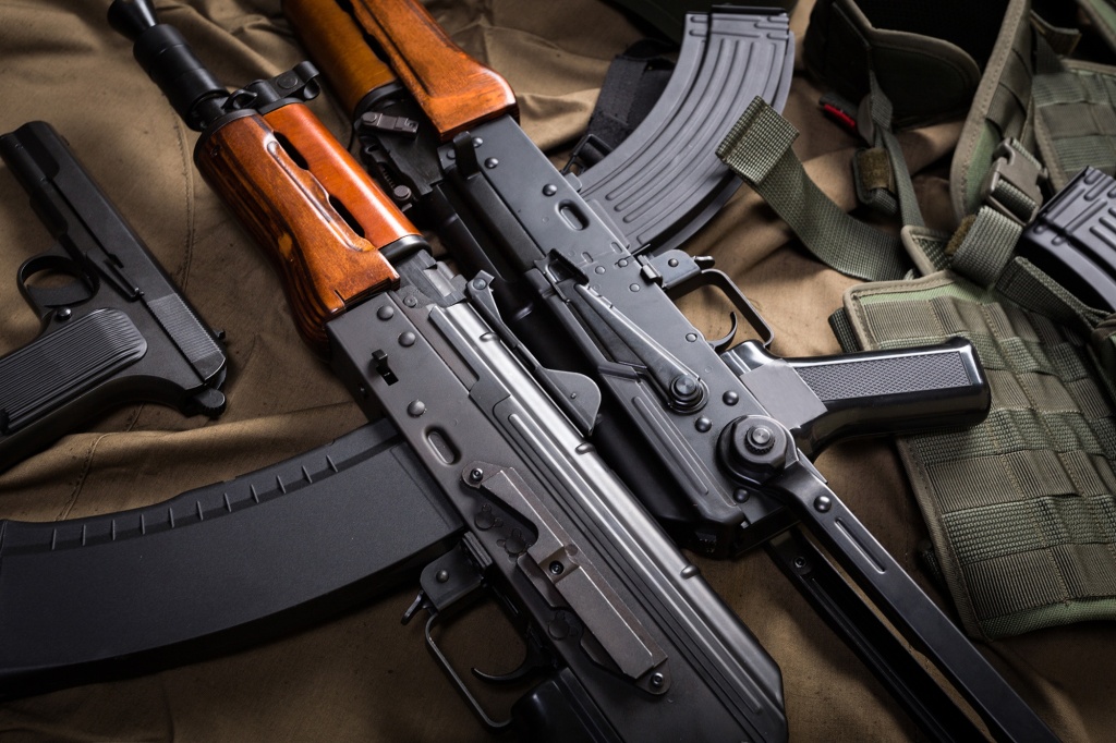 Two AK-47s are pictured (top center).  Britannica says the gun is... "arguably the most widely used shoulder weapon in the world."