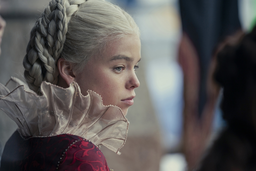 Milly Alcock in a side view with a frilly collar as Princess Rhaenyra Targaryen in "House of the Dragon."