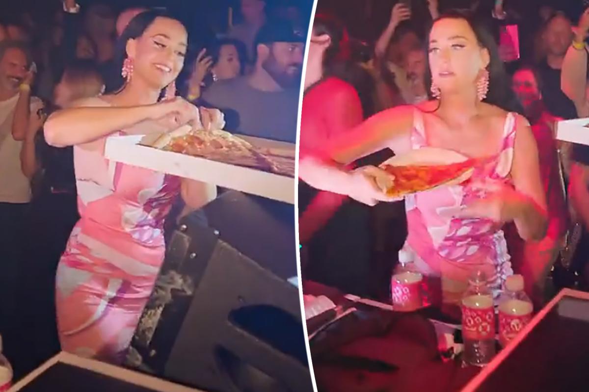 Katy Perry throws pizza slices into the crowd at Las Vegas club