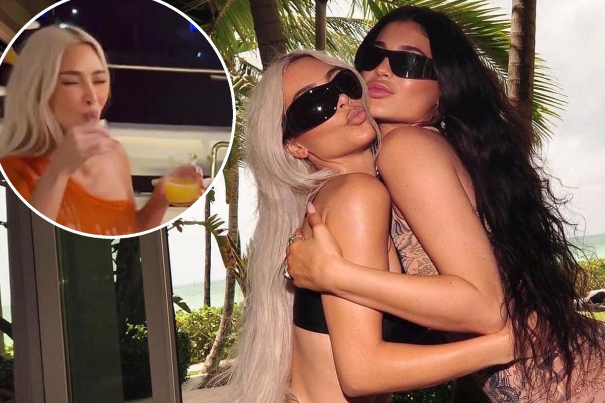Kim Kardashian spits out a shot of liquor at Kylie's birthday party
