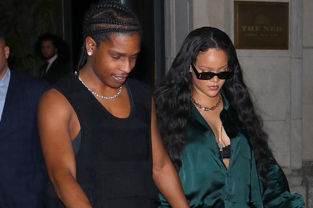 Rihanna wears leather mini skirt, low cut top with A$AP Rocky