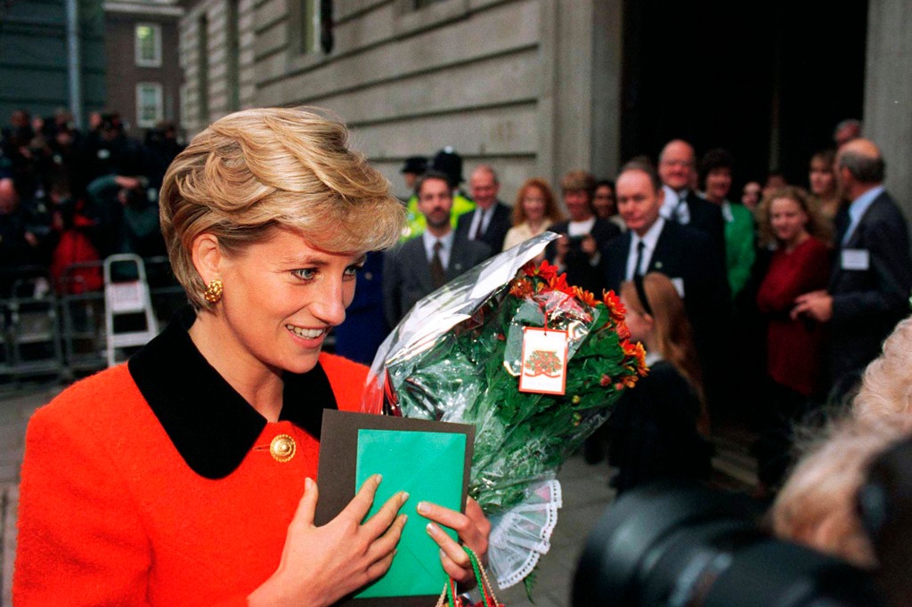 Princess Diana in a red blazer.