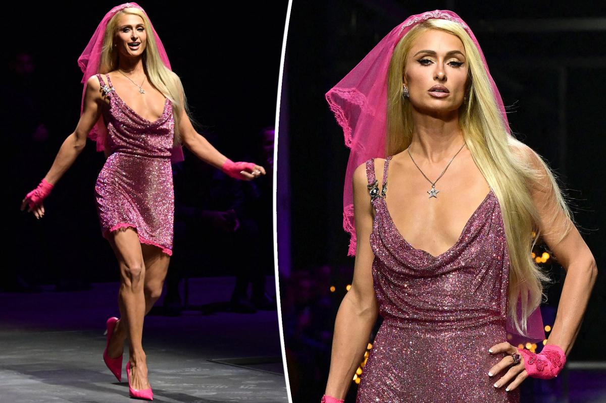 Paris Hilton on the catwalk for Versace